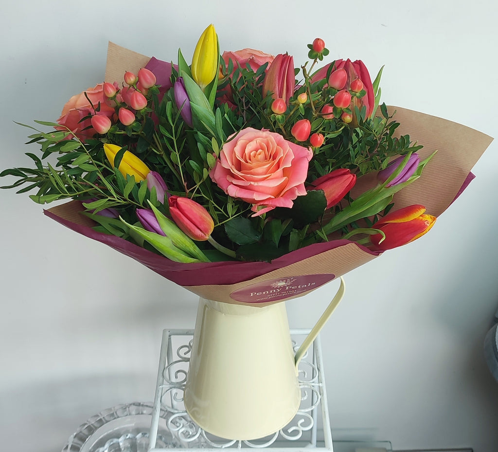 Coral rose and tulip bouquet